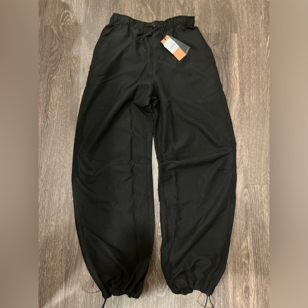 Black parachute pants